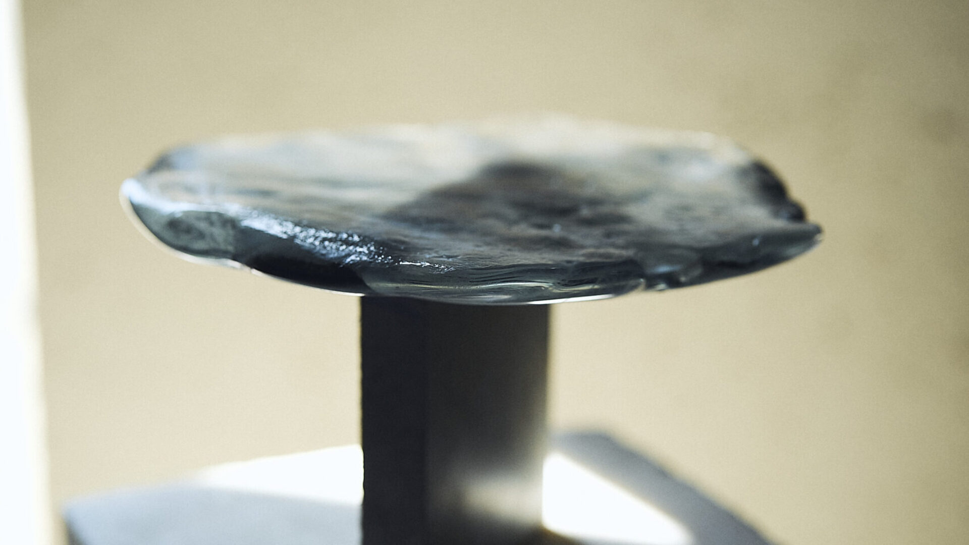 A bronze and marble table from the new Barbera Studio Collection titled “2024BCE–2024 CE